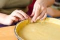 Baker shaping pie crust Royalty Free Stock Photo