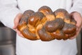 Baker showing freshly baked loaf Royalty Free Stock Photo