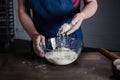 Baker sifting flour Royalty Free Stock Photo