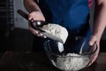 Baker sifting flour Royalty Free Stock Photo