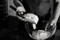 Baker sifting flour Royalty Free Stock Photo