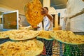 Buy fresh flatbread, Kerman, Iran