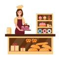 Baker woman in the bakary shop Royalty Free Stock Photo