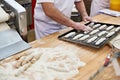 Bakers cook dough for roll buns