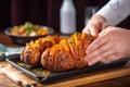 bakers hands displaying well-cooked baked sweet potato