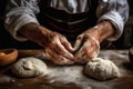 bakers hands shaping dough for artisan bread making