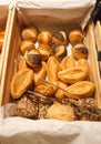 Bakery Assortment in wooden crate background. Farmhouse Freshly Baked Bread Toast Variety, Food Staple from natural organic