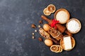 Bakery background with baking ingredients for christmas cooking top view. Flour, brown sugar, eggs and spices top view. Royalty Free Stock Photo