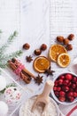 Bakery background with ingredients for cooking Christmas baking. Flour, brown sugar, cranberry and spices top view Royalty Free Stock Photo