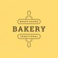 Bakery badge or label retro vector illustration rolling pins silhouette for bakehouse