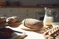 Bakery baker bread. Fresh homemade bread on a table in the kitchen. Royalty Free Stock Photo