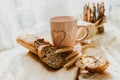 Bakery baker bread and milk. Fresh homemade bread on a table in the kitchen, organic breakfast Royalty Free Stock Photo
