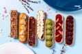 Bakery banner background of eclairs colorful topping