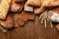 Bakery. Bread On Wood Background Royalty Free Stock Photo