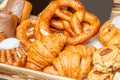 Bakery Bread on a Wooden Table. Various Bread and Sheaf of Wheat Royalty Free Stock Photo