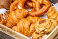 Bakery Bread on a Wooden Table. Various Bread and Sheaf of Wheat Royalty Free Stock Photo