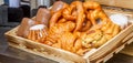 Bakery Bread on a Wooden Table. Various Bread and Sheaf of Wheat Royalty Free Stock Photo