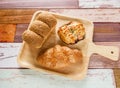 Bakery breakfast on wooden plate