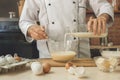 Bakery chef cooking bake in the kitchen professional Royalty Free Stock Photo