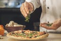 Bakery chef cooking bake in the kitchen professional Royalty Free Stock Photo