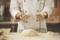 Bakery chef cooking bake in the kitchen professional Royalty Free Stock Photo