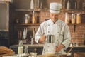 Bakery chef cooking bake in the kitchen professional Royalty Free Stock Photo