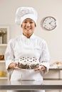 Bakery chef in toque and chefs whites Royalty Free Stock Photo