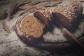 Bakery concept background. Whole grain sliced bread and knife Royalty Free Stock Photo