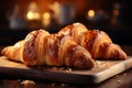 Bakery concept, homemade croissants on a rustic wooden tabletop
