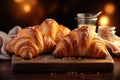 Bakery concept, homemade croissants on a rustic wooden tabletop