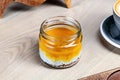 Close up view on chia pudding in bottle with coffee on wooden background. Royalty Free Stock Photo