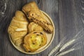 Bakery, croissants and more on a wooden plate