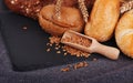 Bakery, crusty loaves of bread and buns. Assortment of baked bread.