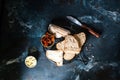 Bakery, crusty loaves of bread. Still life captured from above top view, flat lay . sun-dried tomatoes. Vegetarian food. Healthy