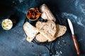 Bakery, crusty loaves of bread. Still life captured from above top view, flat lay . sun-dried tomatoes. Vegetarian food. Healthy