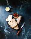 Bakery, crusty loaves of bread. Still life captured from above top view, flat lay . sun-dried tomatoes. Vegetarian food. Healthy