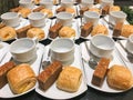 bakery and empty cup of coffee ready for serve in meeting conference Royalty Free Stock Photo