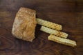 Bakery ingredients - bread, wafer rolls on wood table. Sweet pastry baking concept. Flat lay, copy space, top view. Royalty Free Stock Photo