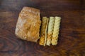 Bakery ingredients - bread, wafer rolls on wood table. Sweet pastry baking concept. Flat lay, copy space, top view. Royalty Free Stock Photo