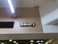 Bakery name board fixed for an newly opened business of selling baked items such as cakes bread in the event of functions upon
