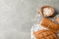 Bakery products composition on grey background, top view