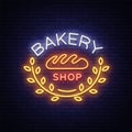 Bakery products logo, fresh bread, loaf. Neon sign, bright banner, shining symbol on the topic of fresh pastries and