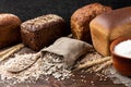 Bakery products on wooden. Baguette, toast bread, crispbreads and bread.
