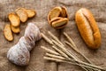 Bakery set with fresh wheaten bread on table rystic background top view