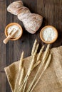 Bakery set with fresh wheaten bread on table rystic background top view