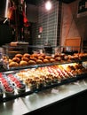 Bakery shop window with assortment of fresh pastries and croissants