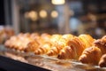 Bakery showcase with a selection of tasty croissants Royalty Free Stock Photo