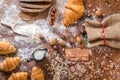 At the bakery, still life with mini Croissants, bread, milk, nuts and flour Royalty Free Stock Photo