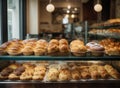 Bakery store showcase, different kinds of delicious fresh breads, cakes, buns and pastries in a baker shop cafe Royalty Free Stock Photo