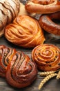 Bakery - various kinds of breadstuff. Bread rolls, bagel, sweet bun. Vertical photo